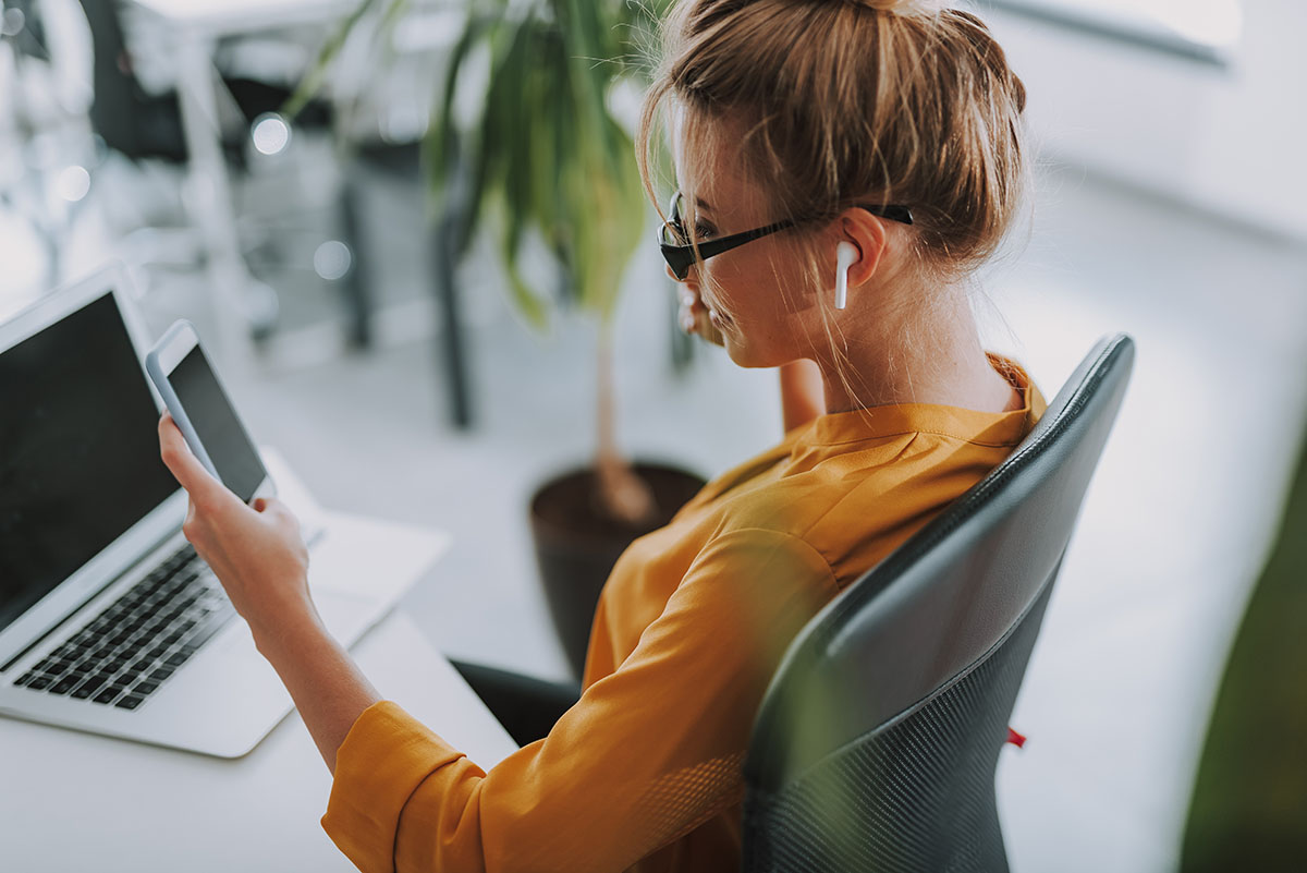 Affordable Office Spaces with Individual Woman Working and Having A Phone Meeting